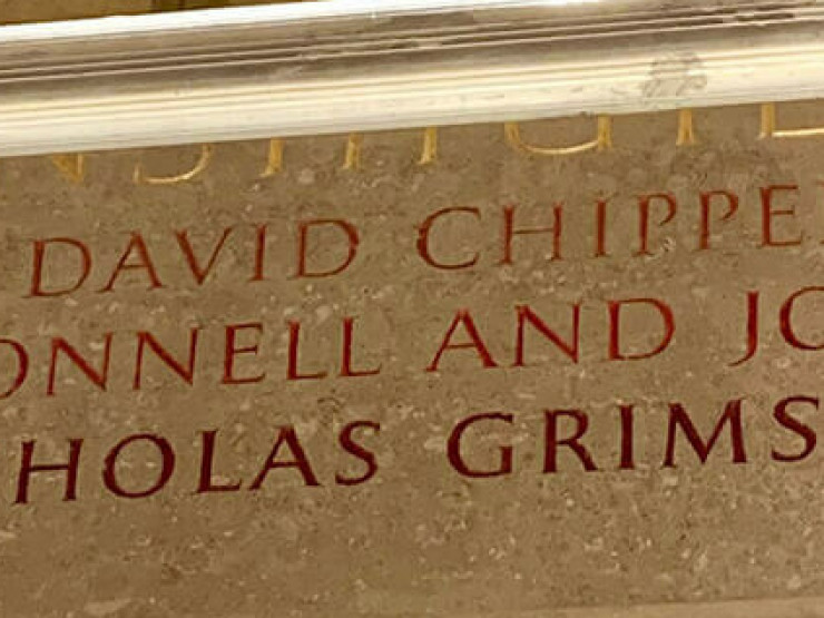 Name carving takes place on RIBA Royal Gold Medal wall